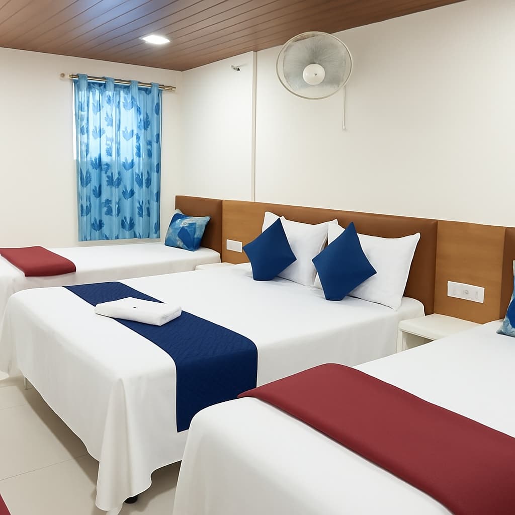 Family Room — a queen bed with twin beds alongside
